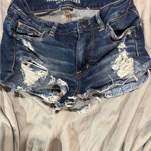American Eagle Outfitters Blue Jean Shorts with Distressing and Frayed Hem